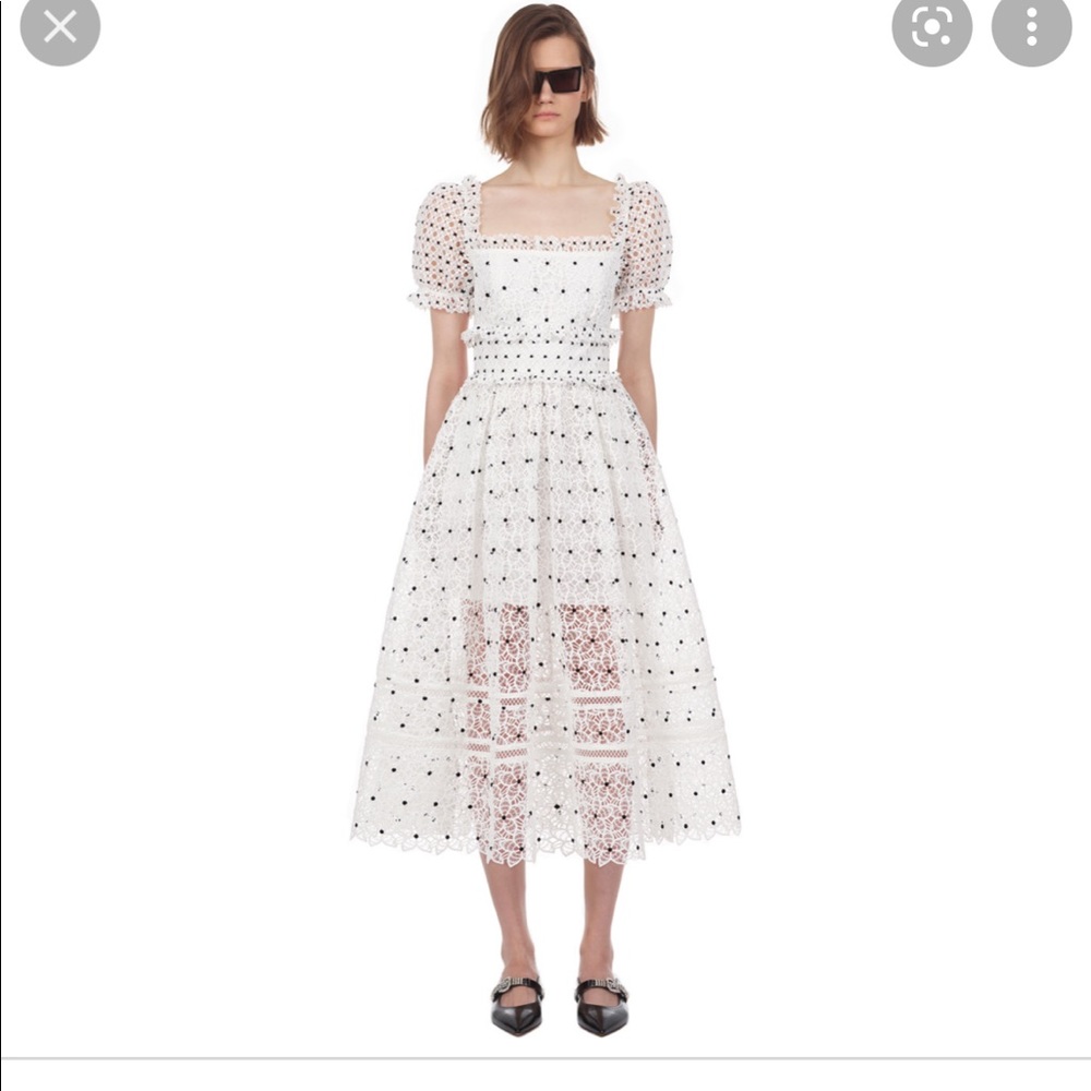 Brand new. Never worn. Short hibiscus guipure dress